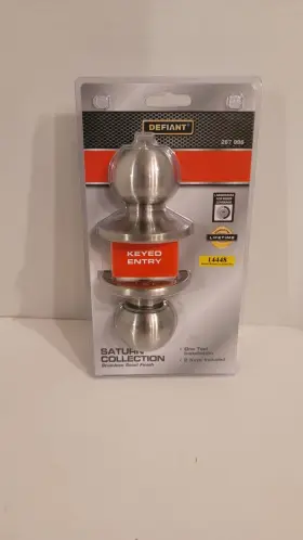 267996 Defiant Saturn Keyed Entry Door Knob In Stainless Steel Lock And 2 Keys