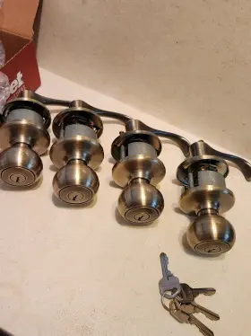 94009-184 Kwikset 4 Sets Copa X Dorian Entry Lever/knob Antique Brass Keyed Alike
