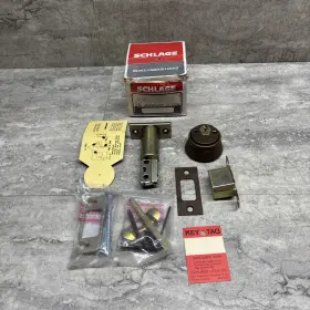 12-076 Schlage B464p 00 613 Deadbolt Kit Antique Bronze No Keys Partial