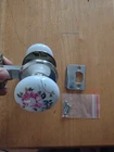 Gainsborough Vintage Passage Latch Set. Floral Porcelain Knobs, Chrome Rosettes. Price: $20.00.