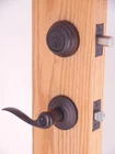 Kwikset Tustin Keyed Entry Lever Deadbolt Venetian Bronze 991TNL11P #8LE Open. Price: $31.99.