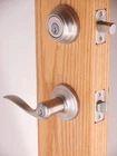 Kwikset 991TNL 15 Signature Tustin Keyed Entry Lever Deadbolt Satin Nickel Open. Price: $35.00.