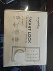 Miuedo Smart Door Lock With Handle, Keyless Entry Deadbolt New. Price: $150.00.