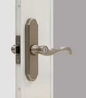 Brushed Nickel Handle Lever Set For Larson Doors With Keyed Lock New. Price: $89.19.