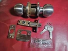 Brinks Transitional Keyed Entry Door Knob Satin Nickel Open. Price: $18.00.