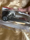 Kwikset Keyed Entry Hollis Lever Satin Nickel Open. Price: $14.99.