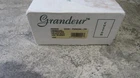 Grandeur 822058, Single Dummy, Polished Brass Parthenon Plate, Eden Prairie Knob Used. Price: $39.02.