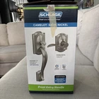 Schlage Camelot Entry Door Handle With Lever Satin Nickel FE285CAM619ACCCAM Open. Price: $59.99.