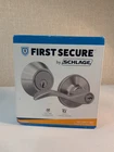First Secure By Schlage Keyed Entry Door Lever Lock And Dead Bolt Security Set Open. Price: $40.00.