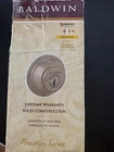 Baldwin Prestige Series Round Deadbolt Smartkey Satin Nickel, 93800-008 Open. Price: $30.00.