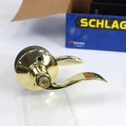 Schlage Accent Reversible Privacy Lock Lever Set In Brass F40 605 Open. Price: $12.00.
