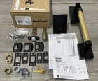Kwikset 818PVHLIP-5144S.STRKP Prava Exterior Handleset Matte Black/satin Brass Open. Price: $179.99.