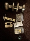 Kwikset Tylo Antique Brass Entry Knob And Double Cylinder Deadbolt Combo Pack Open. Price: $20.00.